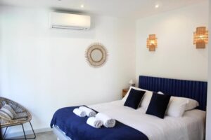 Chambre familiale climatisée à Les Suites d'Agosta