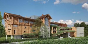 façade extérieure de l'hôtel Werdenfelserei en Bavière mélangeant le bois et le beton