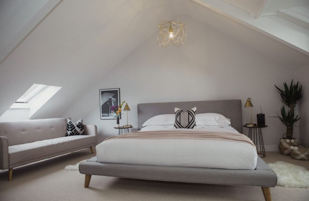 Chambre deluxe famille avec un canapé lit pouvant accueillir 3 personnes