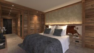 chambre douillette dans un hotel de luxe typiquement savoyard