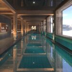 piscine intérieure de l'hôtel M Lodge et spa sur le domaine des 3 vallées