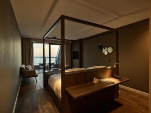 chambre double cosy avec terrasse et vue sur la mer en Zélande