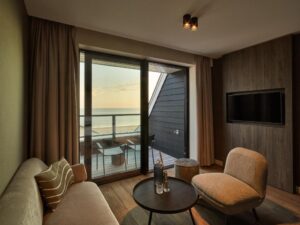 coin salon et terrasse offrant une vue panoramique sur la mer de Zélande