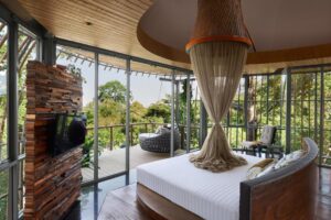 chambre avec terrasse et vue panoramique sur la nature