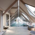 piscine extérieure chauffée à débordement sur le toit de l'hôtel Goldene Rose en Bavière