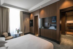 chambre supérieure cosy et élégante au Umiltà 36 à Rome