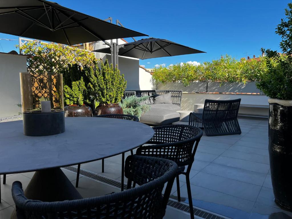 rooftop, toit terrasse, aménagé pour se détendre à l'hôtel Porta Nera private Living dans Florence