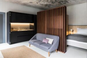 studio avec kitchenette, coin repas, salon et chambre à l'hôtel Antica Dimore Le Misure