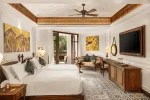 chambre premium avec balcon et vue sur la végétation luxuriante