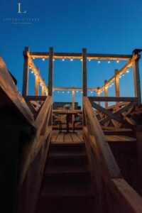 terrasse Altana illuminée pour soirée romantique avec vue sur les toits de Venise