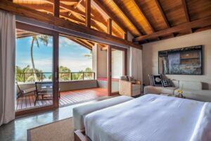 chambre à l'étage avec terrasse et vue mer à l'hôtel Villa Thamburu