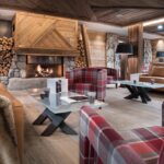 bar louunge avec cheminée pour un moment convivial dans la résidence Le Cristal de Jade à Chamonix-Mont-Blanc