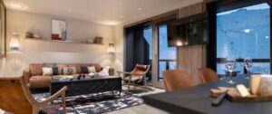 salon d'un appartement à la résidence 4* ynycio avec piscine et spa à Tignes Val Claret
