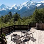 vue panoramique sur les montagnes depuis la terrasse du spa de la résidence hôtelière Les Granges d'en Haut dans la station Les Houches