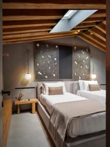 chambre avec lits jumeaux dans une suite du Fornace Suite à Florence