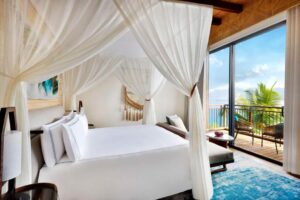 chambre élégante et chic avec vue sur l'océan indien à l'hôtel Mango House Seychelles