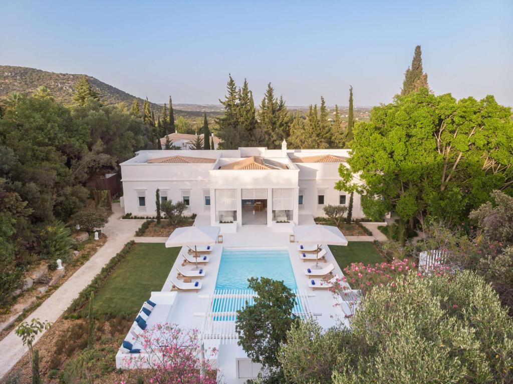 Villa en location vacances avec piscine privée en Algarve dans un hôtel avec service hôtelier