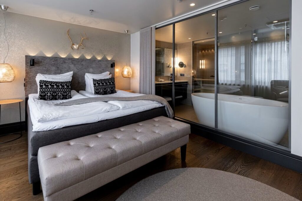 chambre deluxe élégante et intimiste à l'ambiance feutrée et romantique